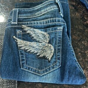 Embellished Low Rise Blue Jeans with Wing Design